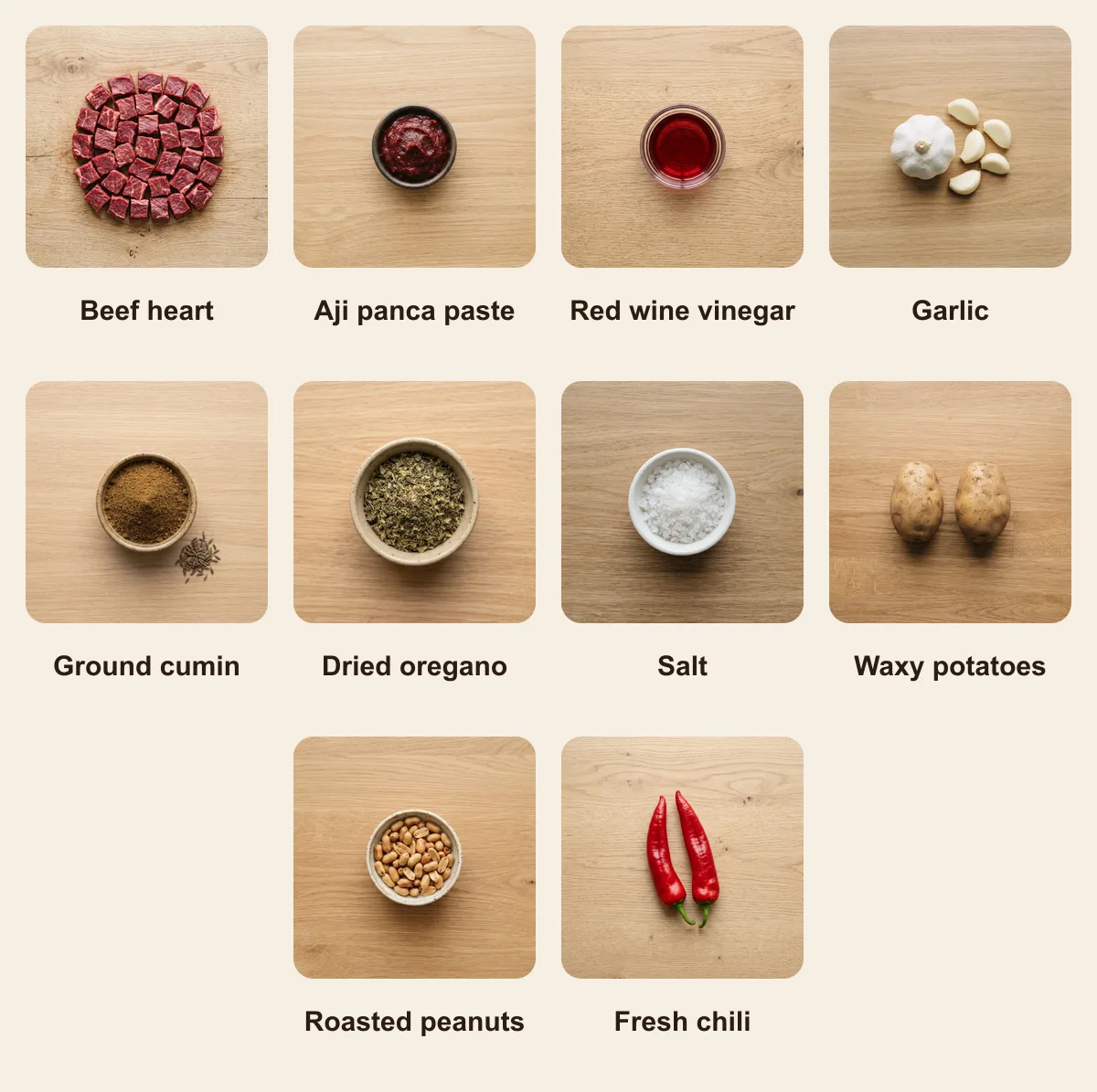 Everything you need for Anticucho (Andean variants), laid out from above: Beef heart, Aji panca paste, Red wine vinegar, Garlic, Ground cumin, Dried oregano, Salt, Waxy potatoes, Roasted peanuts, Fresh chili (AI illustration)