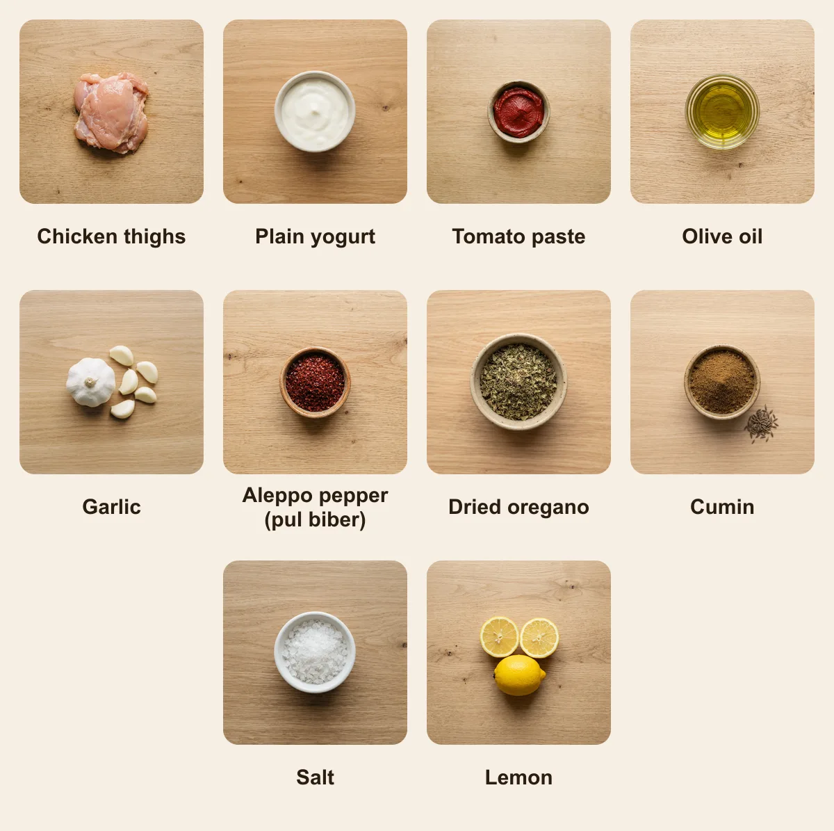 Everything you need for Chicken Shish (Tavuk Shish), laid out from above: Chicken thighs, Plain yogurt, Tomato paste, Olive oil, Garlic, Aleppo pepper (pul biber), Dried oregano, Cumin, Salt, Lemon (AI illustration)