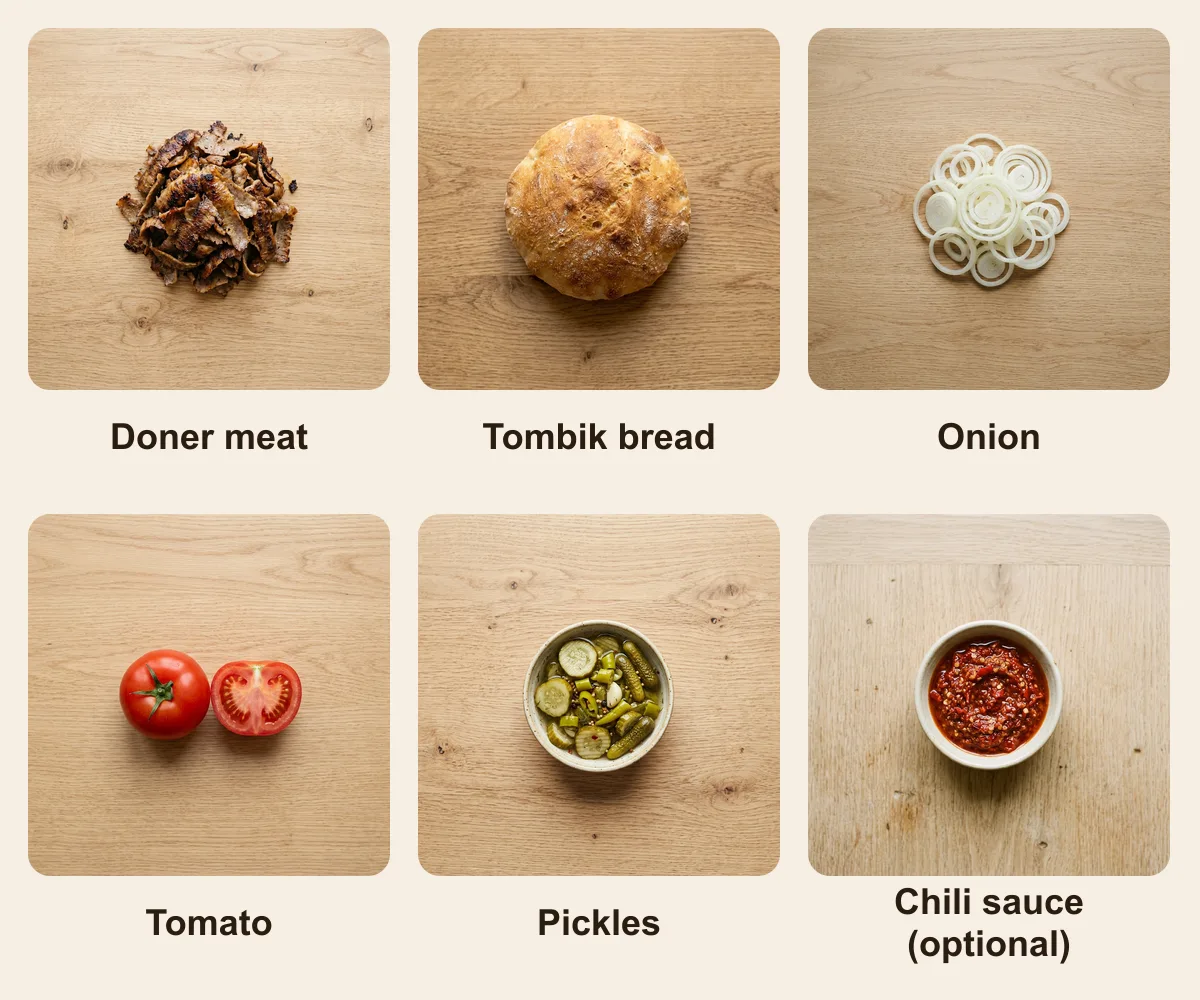 Everything you need for Tombik Doner, laid out from above: Doner meat, Tombik bread, Onion, Tomato, Pickles, Chili sauce (optional) (AI illustration)
